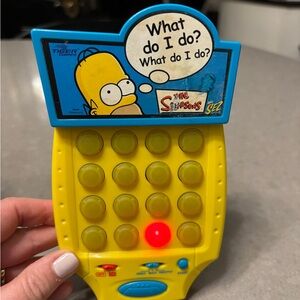 The Simpsons Sez Sound Matching Electronic Handheld Game (2003)